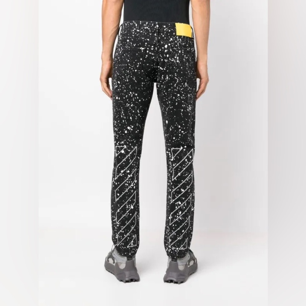 OFF-WHITE • Diagonal stripe paint splatter skinny jeans